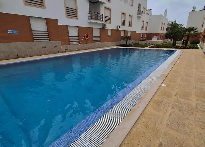 Bright Flat W/ Terrace & Pools By Hostwise 公寓 塔维拉